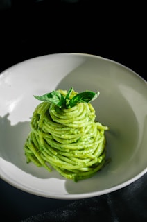 Delicious pesto pasta with fresh basil.