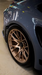 A detailed close-up of a car wheel.