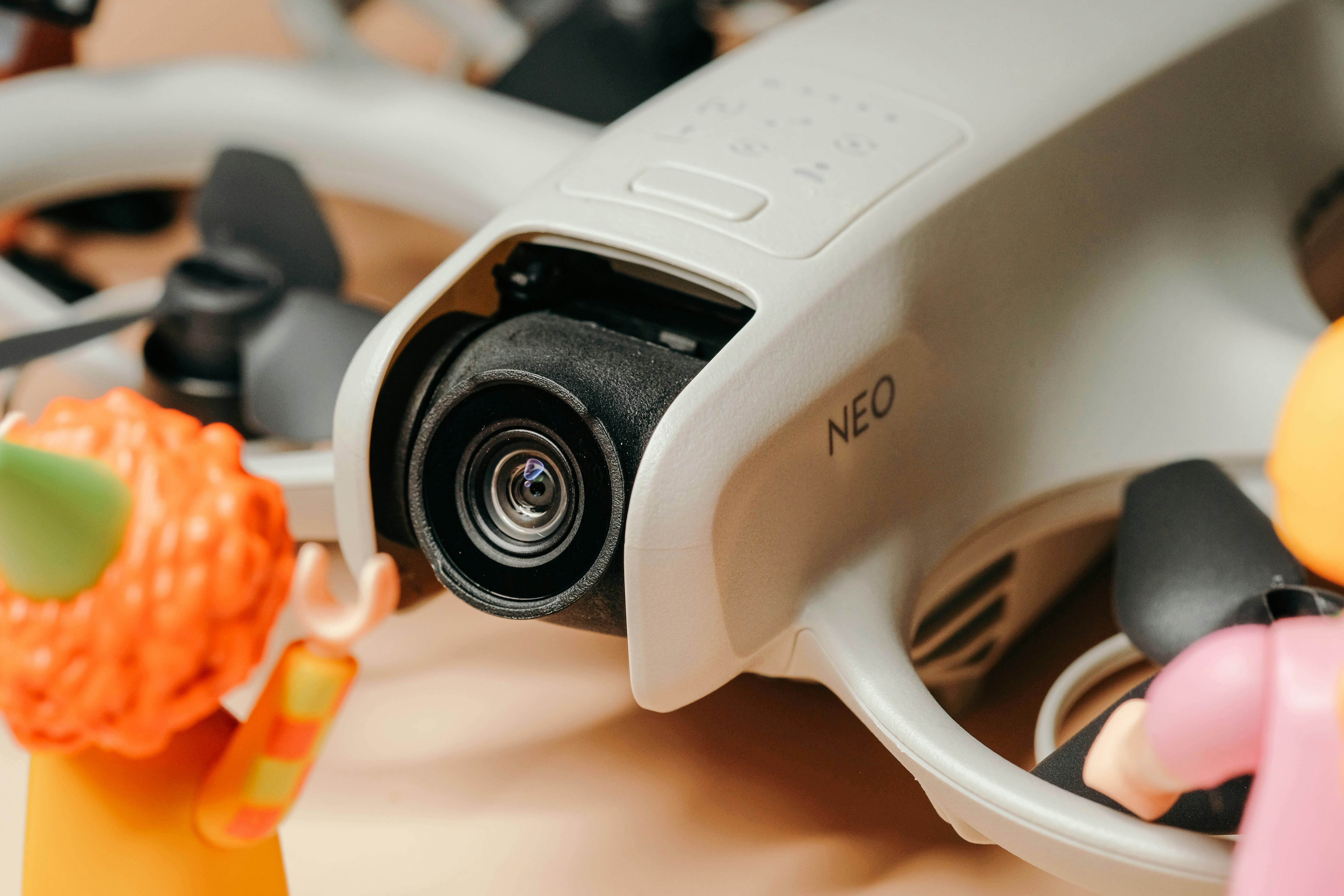 A drone camera is in focus with playmobil figures