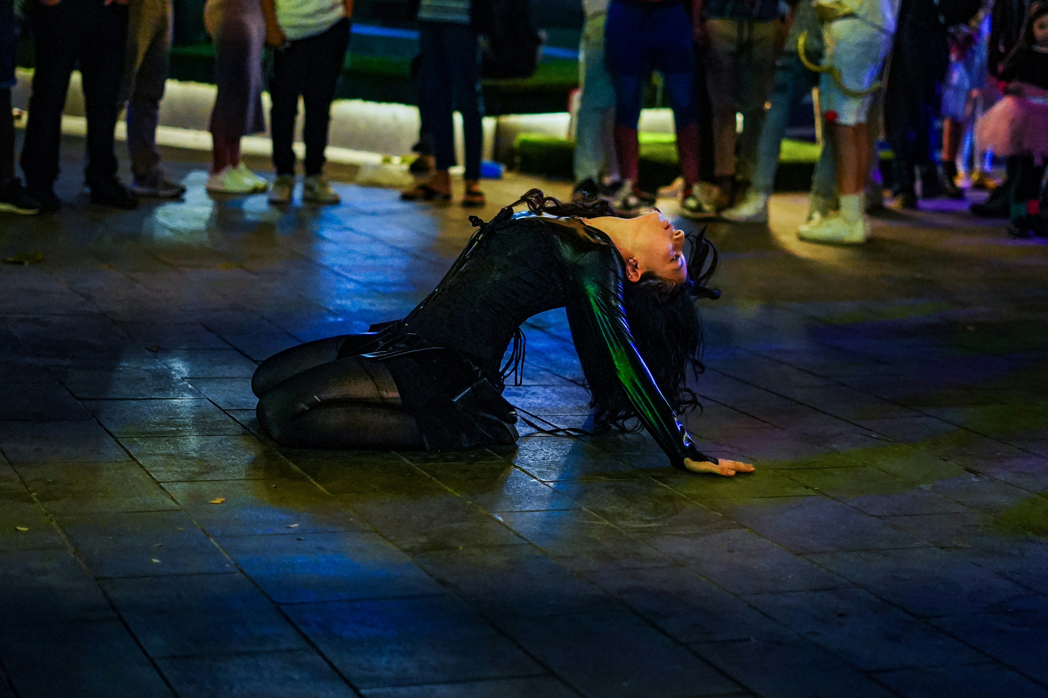 A dancer performs on the floor.