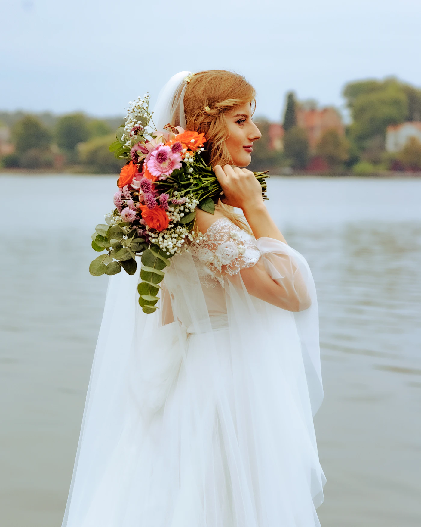 How to finance your dream wedding responsibly — A newlywed couple reviewing their wedding budget at a reception table.
