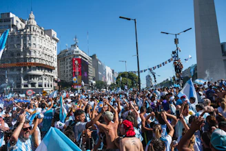 Argentinians celebrate in a bustling city square.