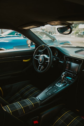 Inside the luxurious interior of a porsche.