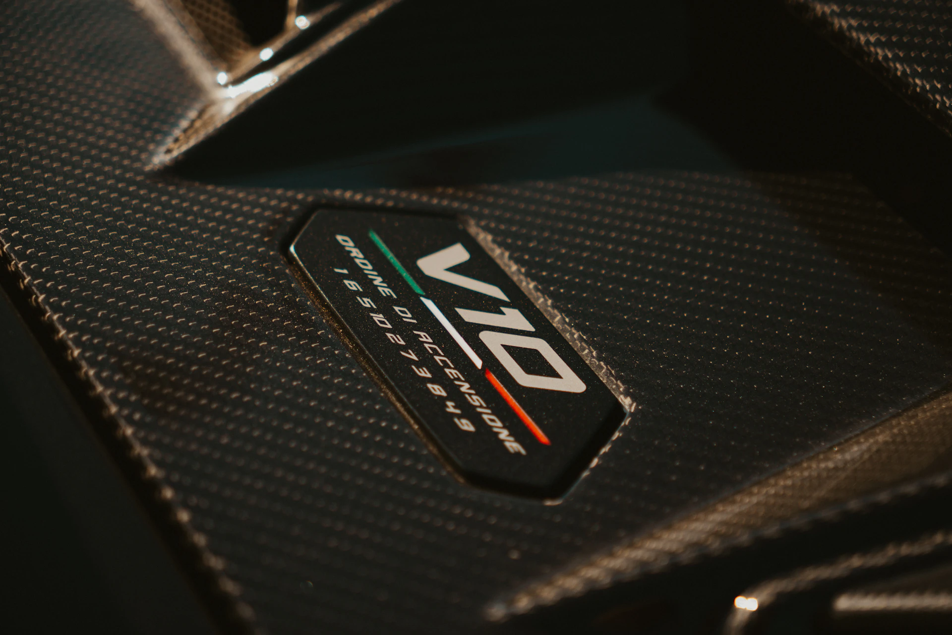 A v10 engine badge in detail.
