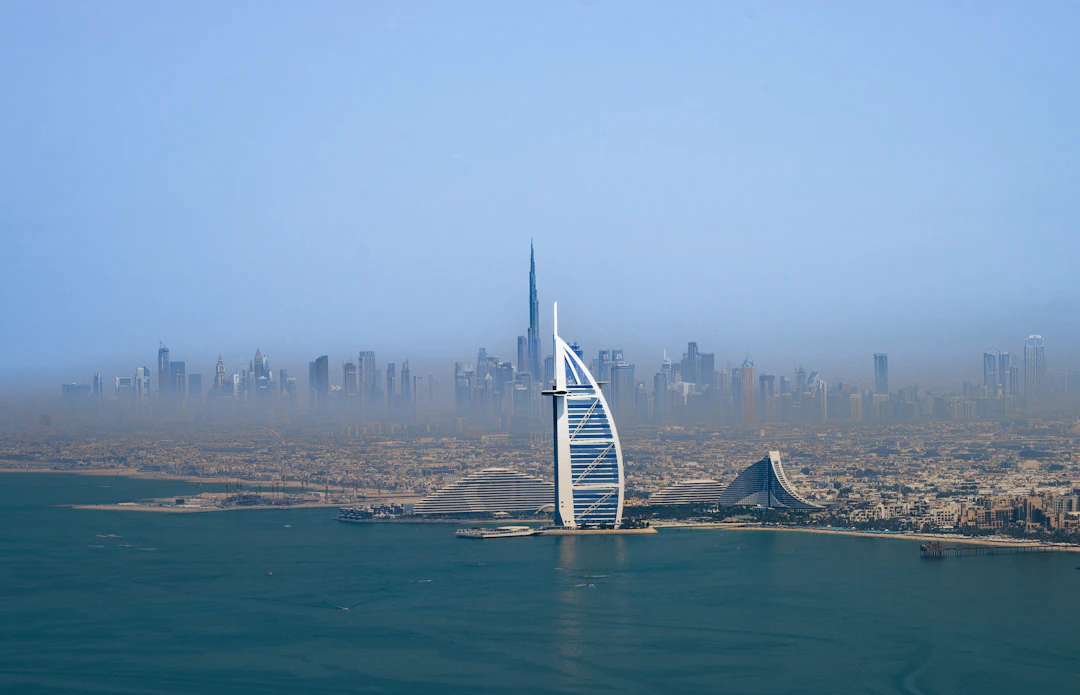 Dubai skyline featuring the Burj Al Arab and Burj Khalifa, illustrating the AED 2 million property route for the Golden Visa.