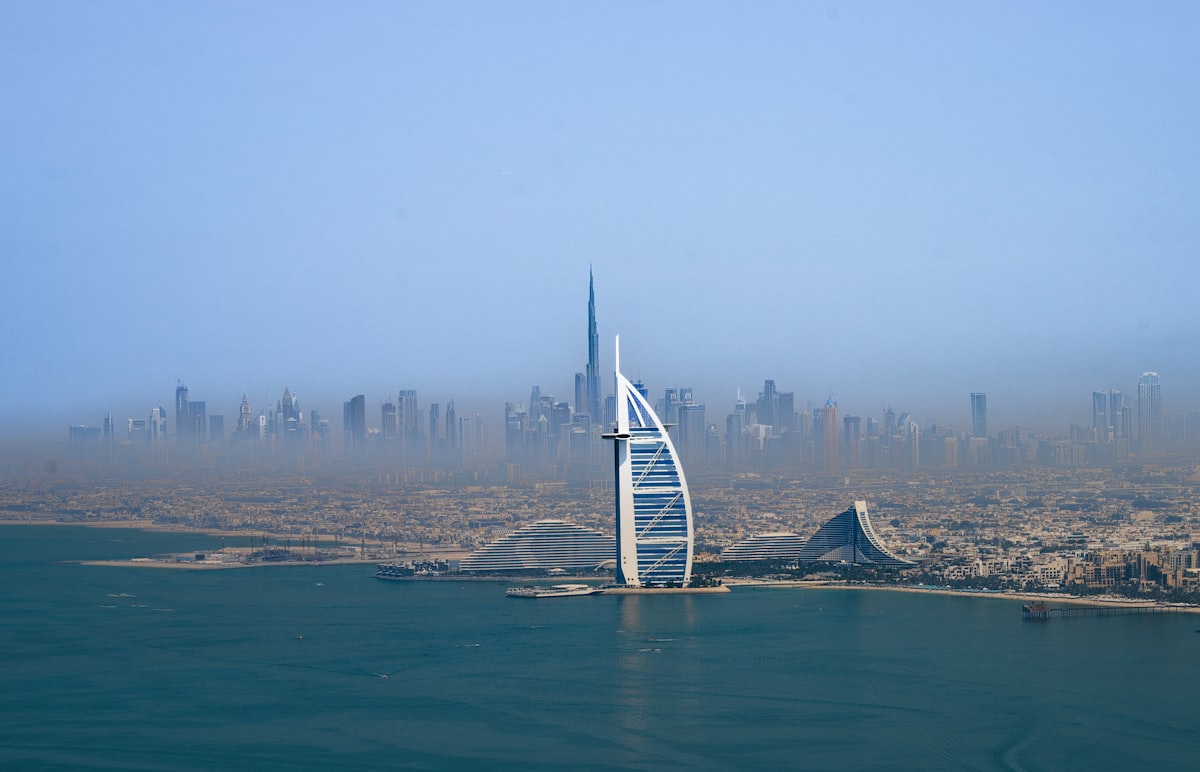 Dubai skyline featuring the Burj Al Arab and Burj Khalifa, illustrating the AED 2 million property route for the Golden Visa.