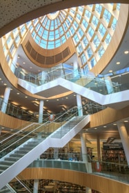 A modern library with a beautiful domed ceiling.