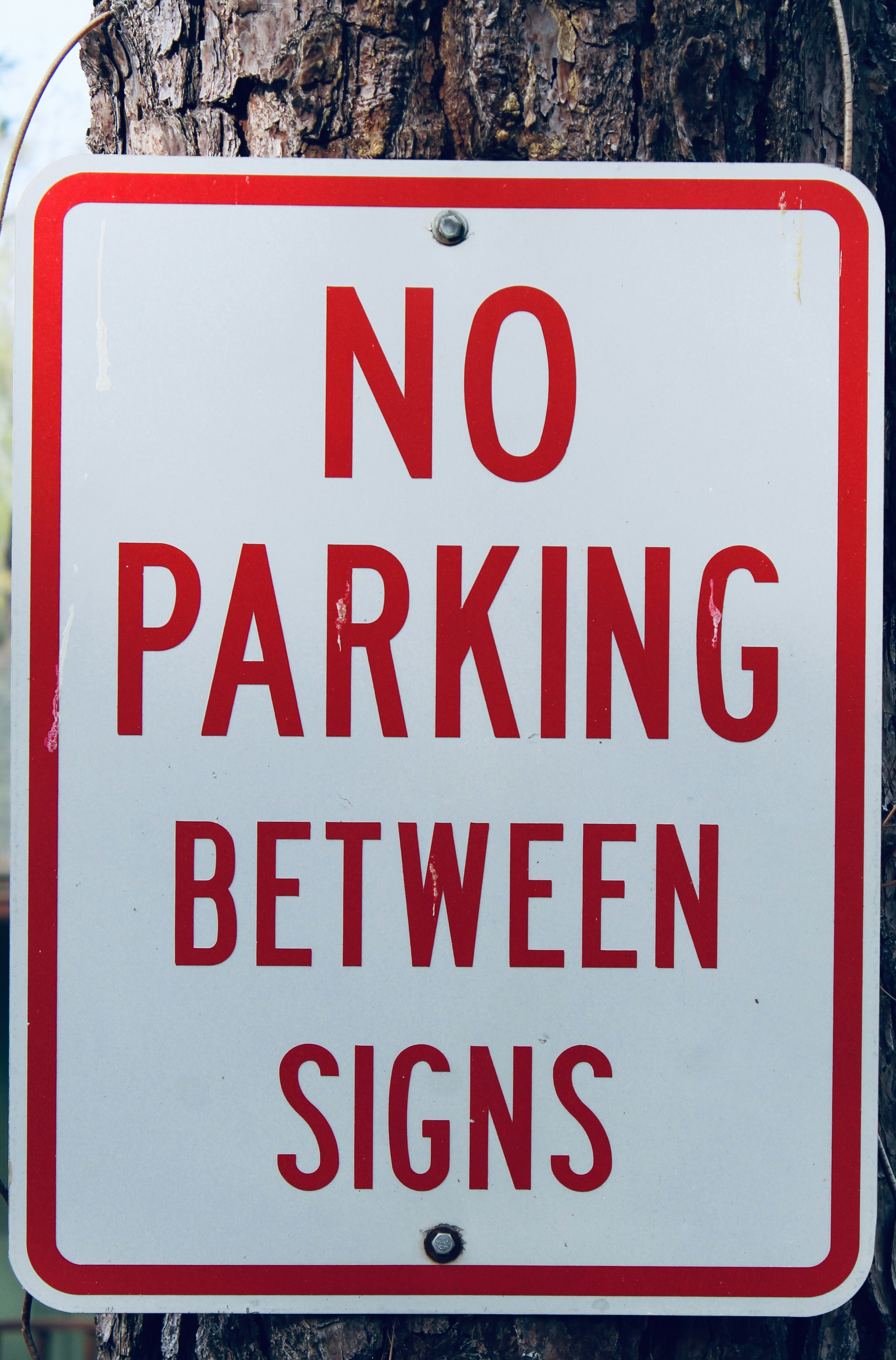 No parking between signs.