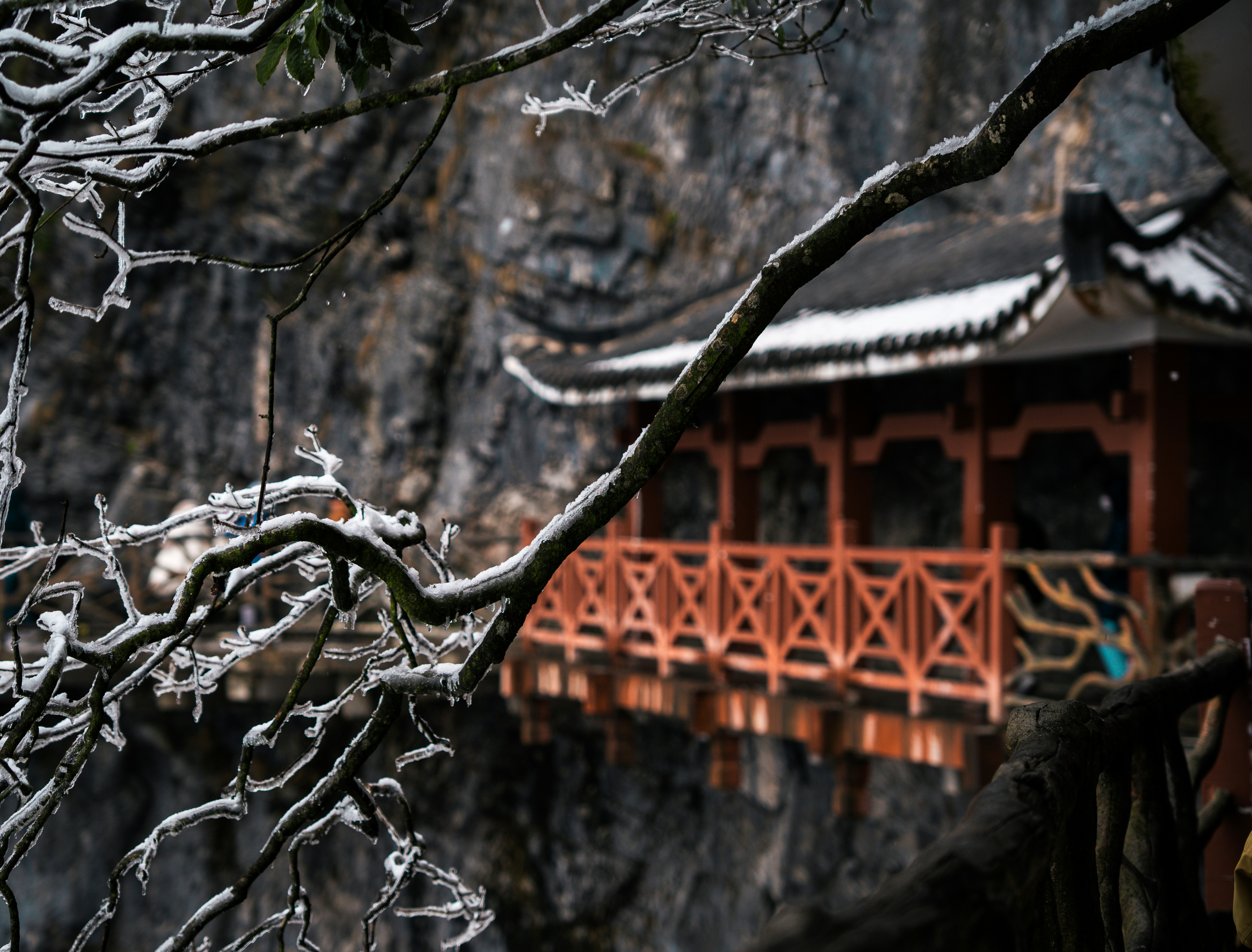 A traditional chinese temple on a rocky cliff. - Zhangjiajie