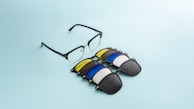 Glasses with multiple tinted magnetic lenses.