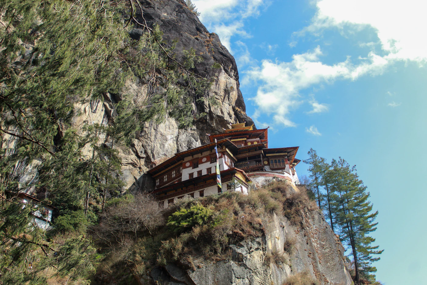 Tiger's Nest Monastery (Paro Taktsang) clinging to a cliff face high above the Paro valley in Bhutan