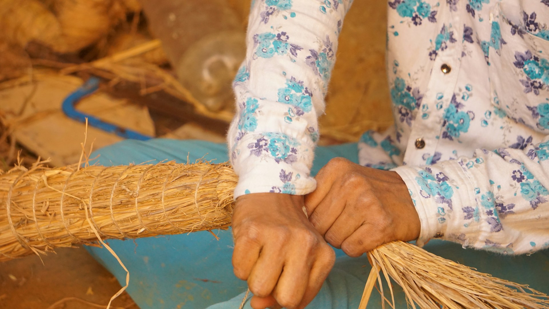 A person is crafting with natural materials.