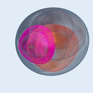 Abstract shapes are inside a larger sphere.