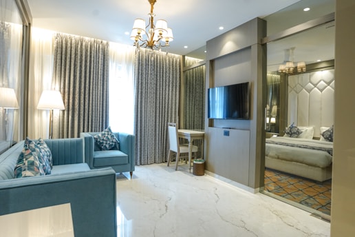 A luxurious hotel room with elegant furnishings.