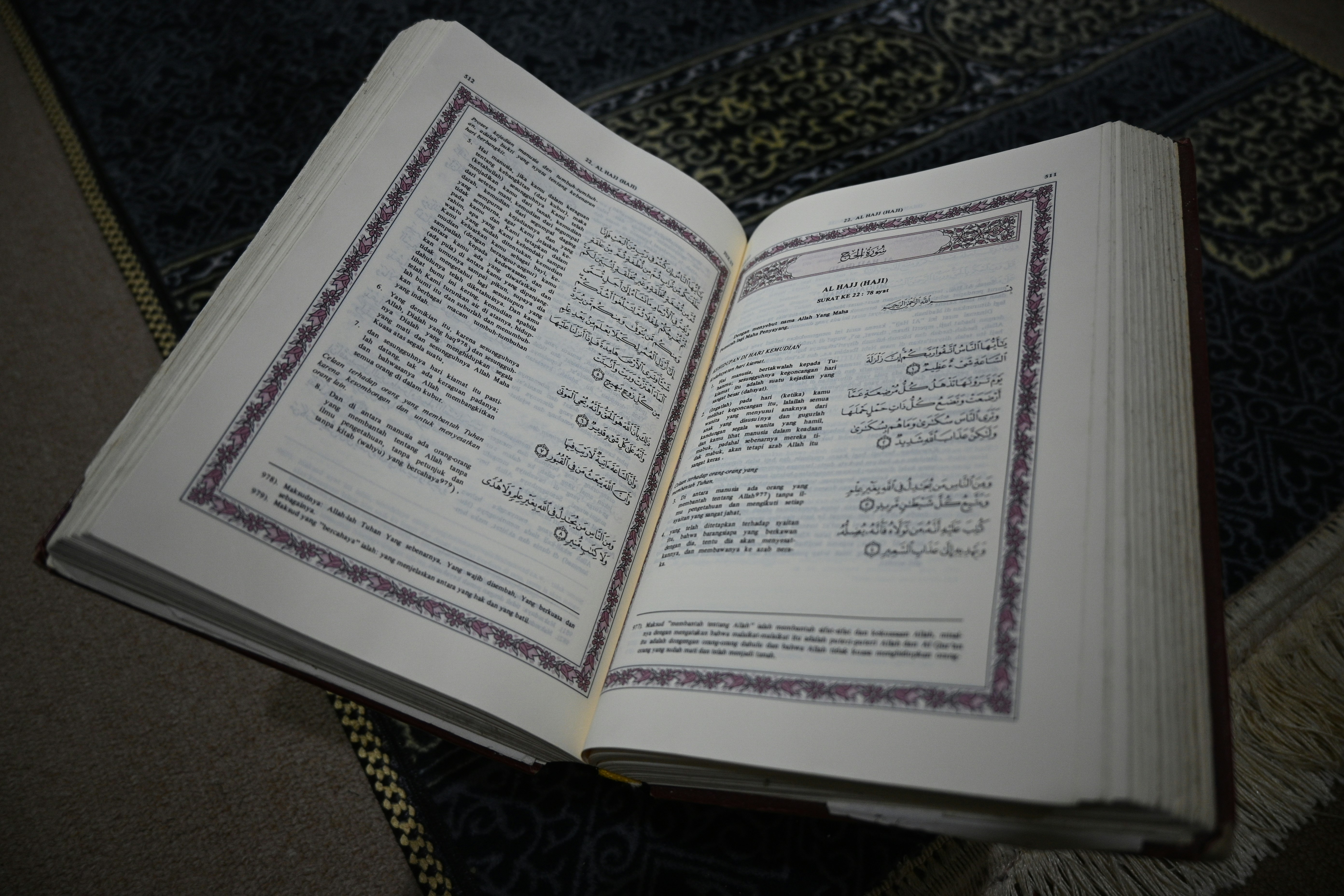 Open book displaying arabic script.