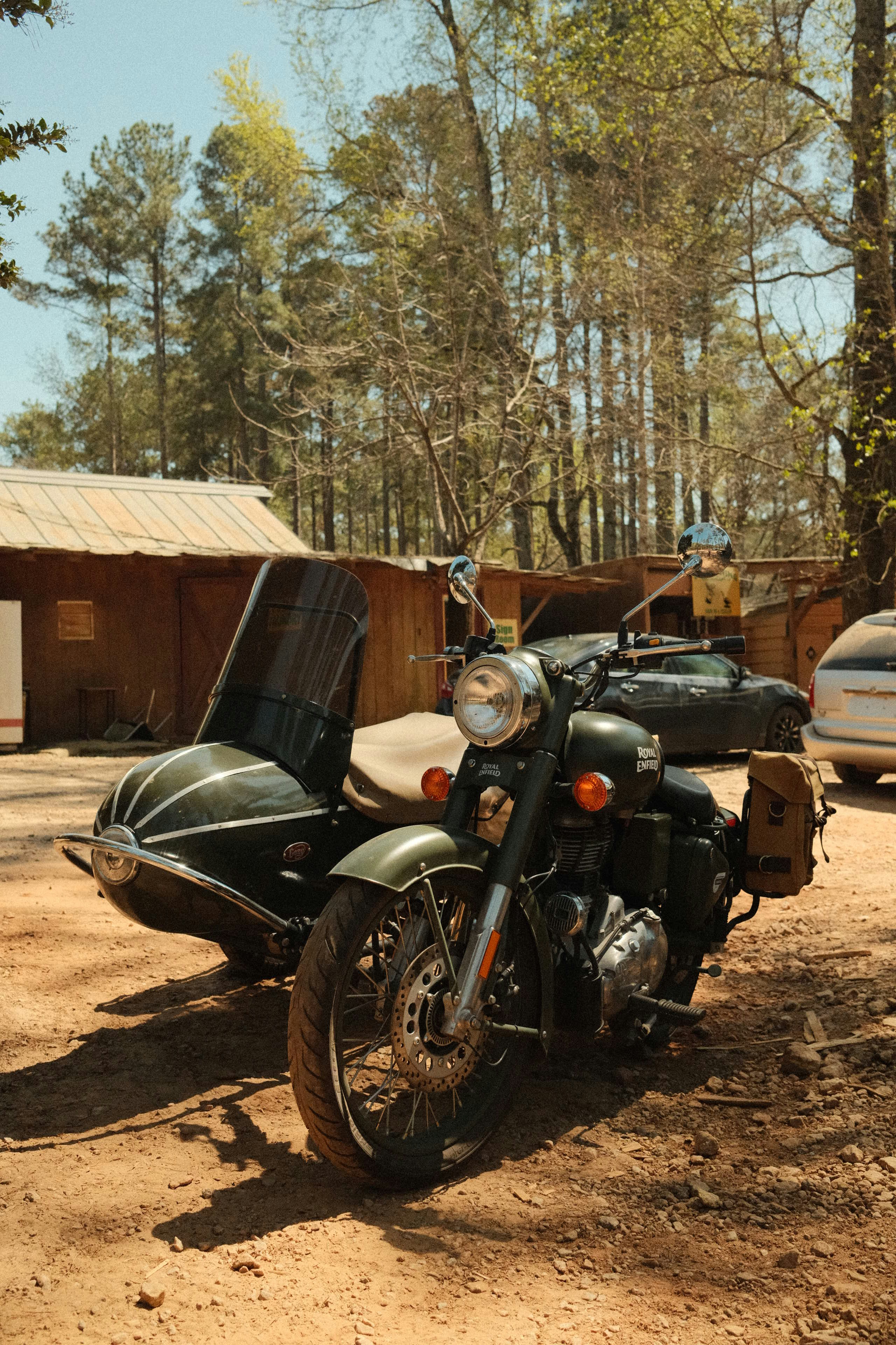 A motorcycle with a sidecar sits outdoors.
