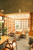 A cozy restaurant interior with wooden furniture.