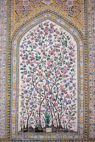 Colorful floral design on an ornate wall.