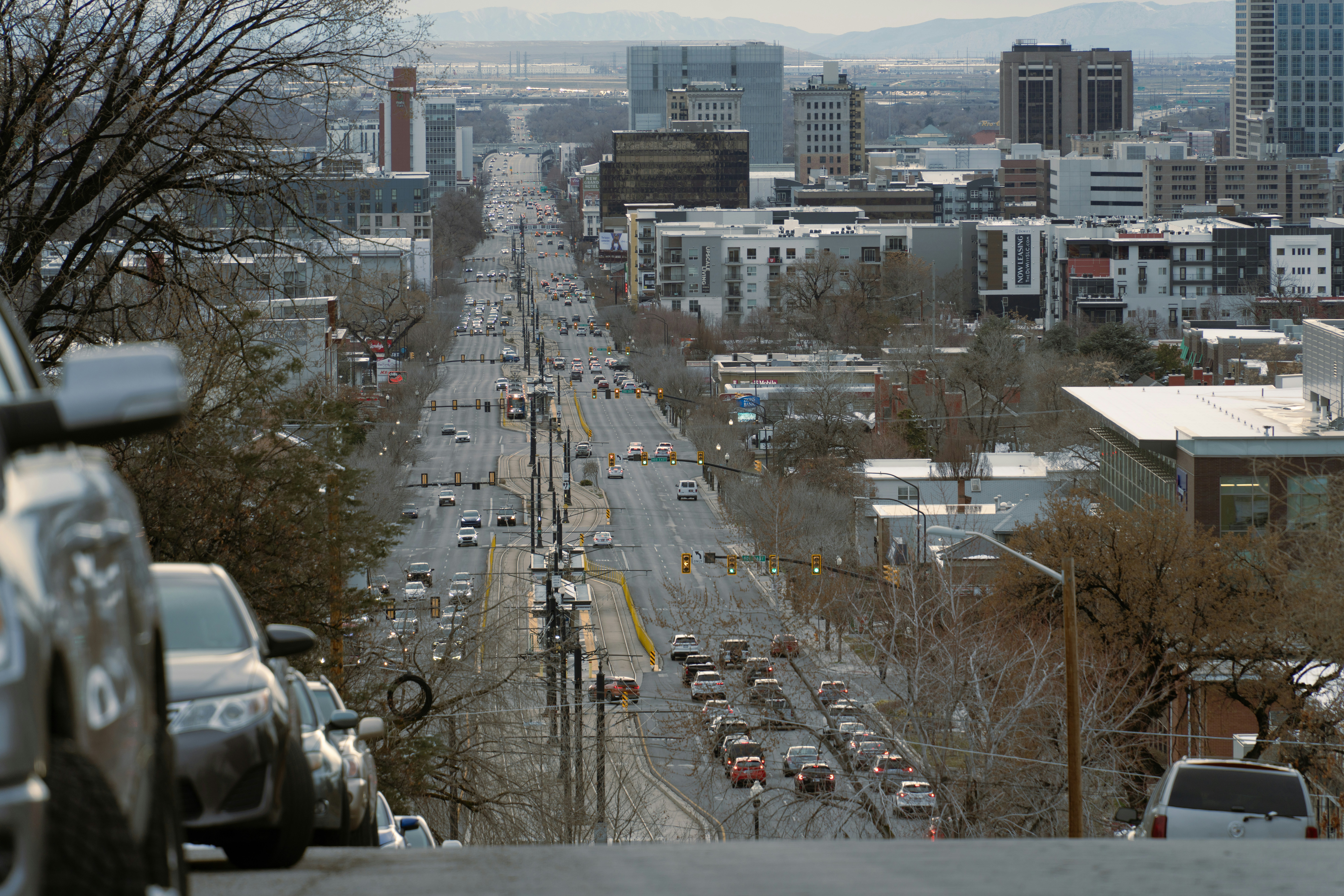A long road through a busy city.