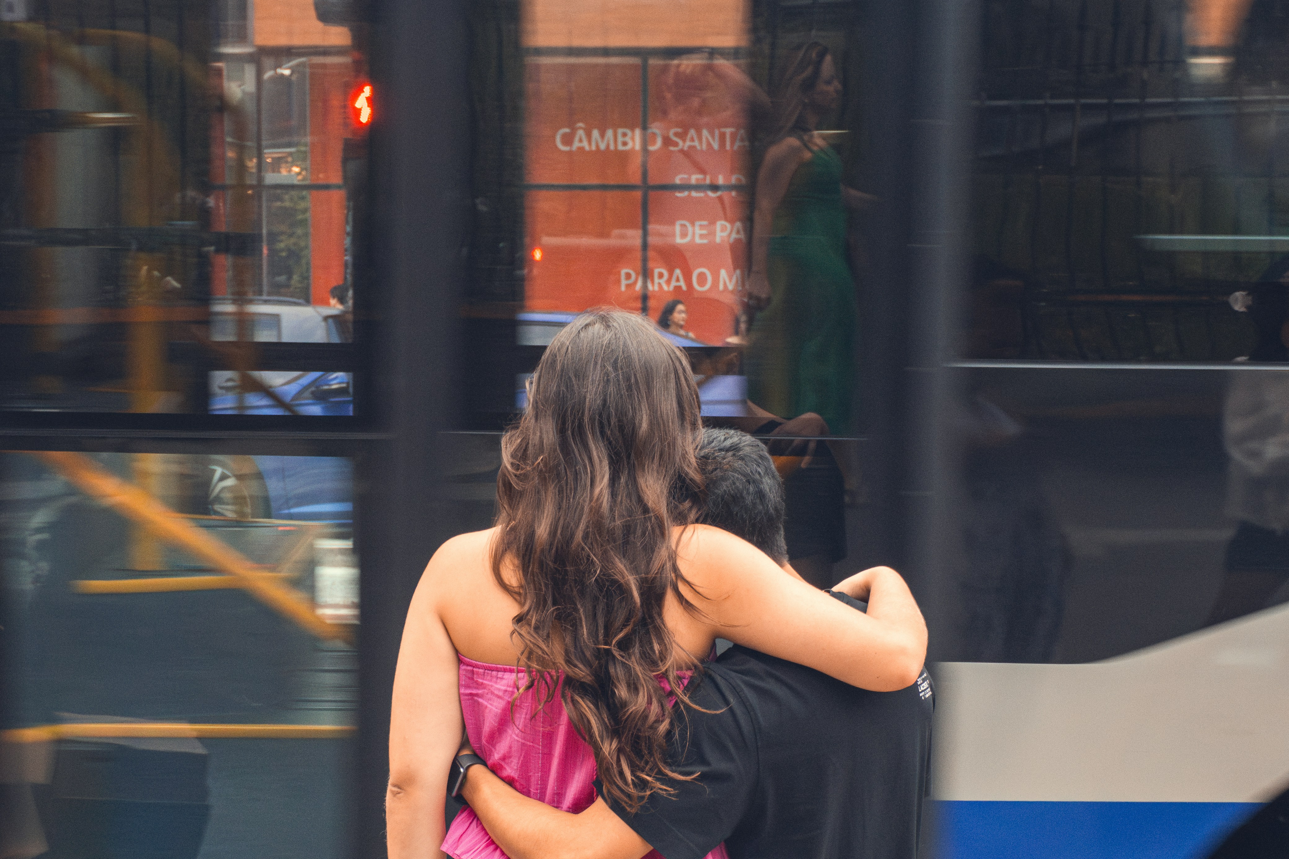 A woman wearing a stylish yoga wear set while walking in a city.