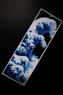 A bookmark featuring a wave-inspired design.