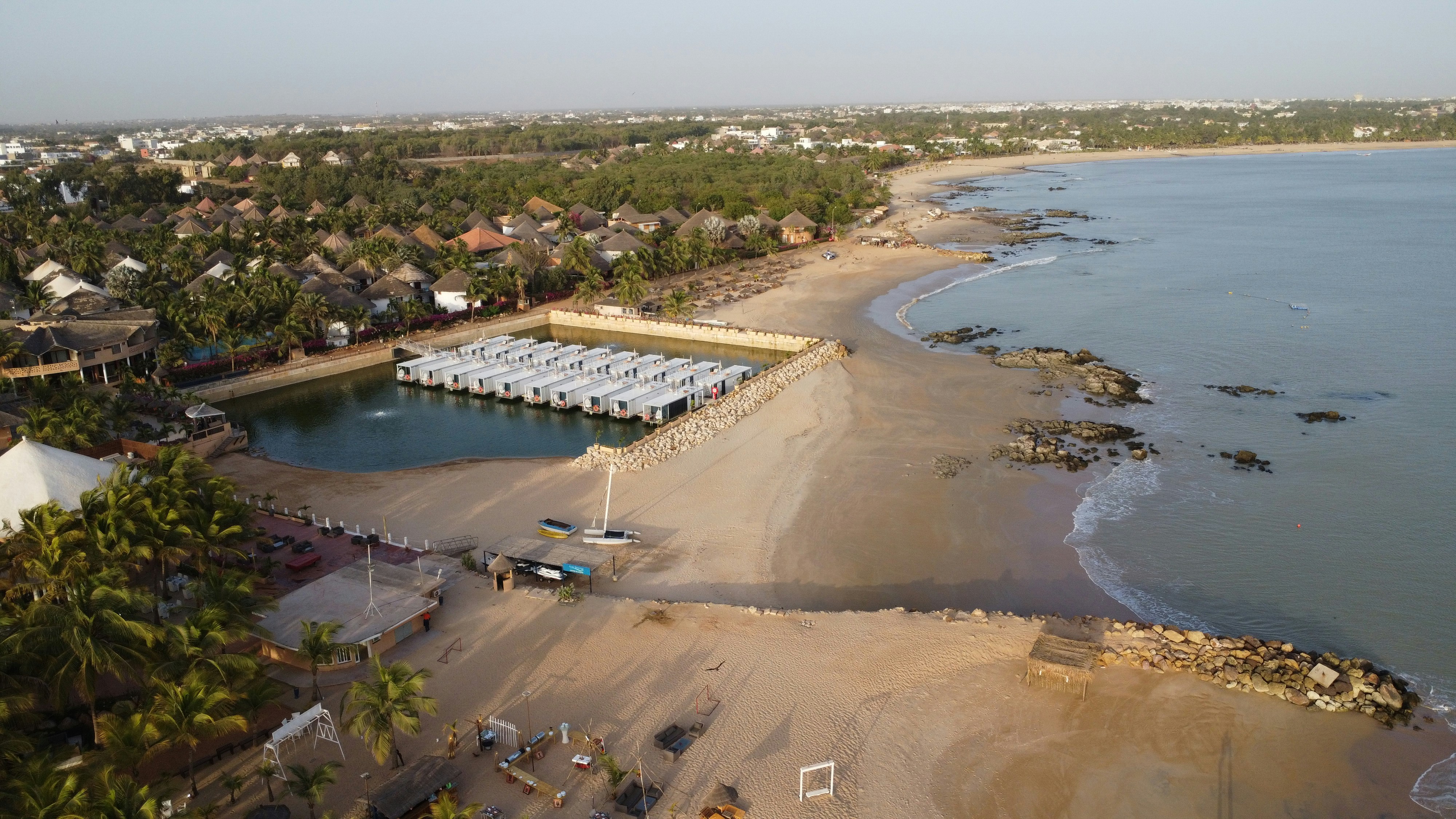 Aerial view of a coastal resort and beach.