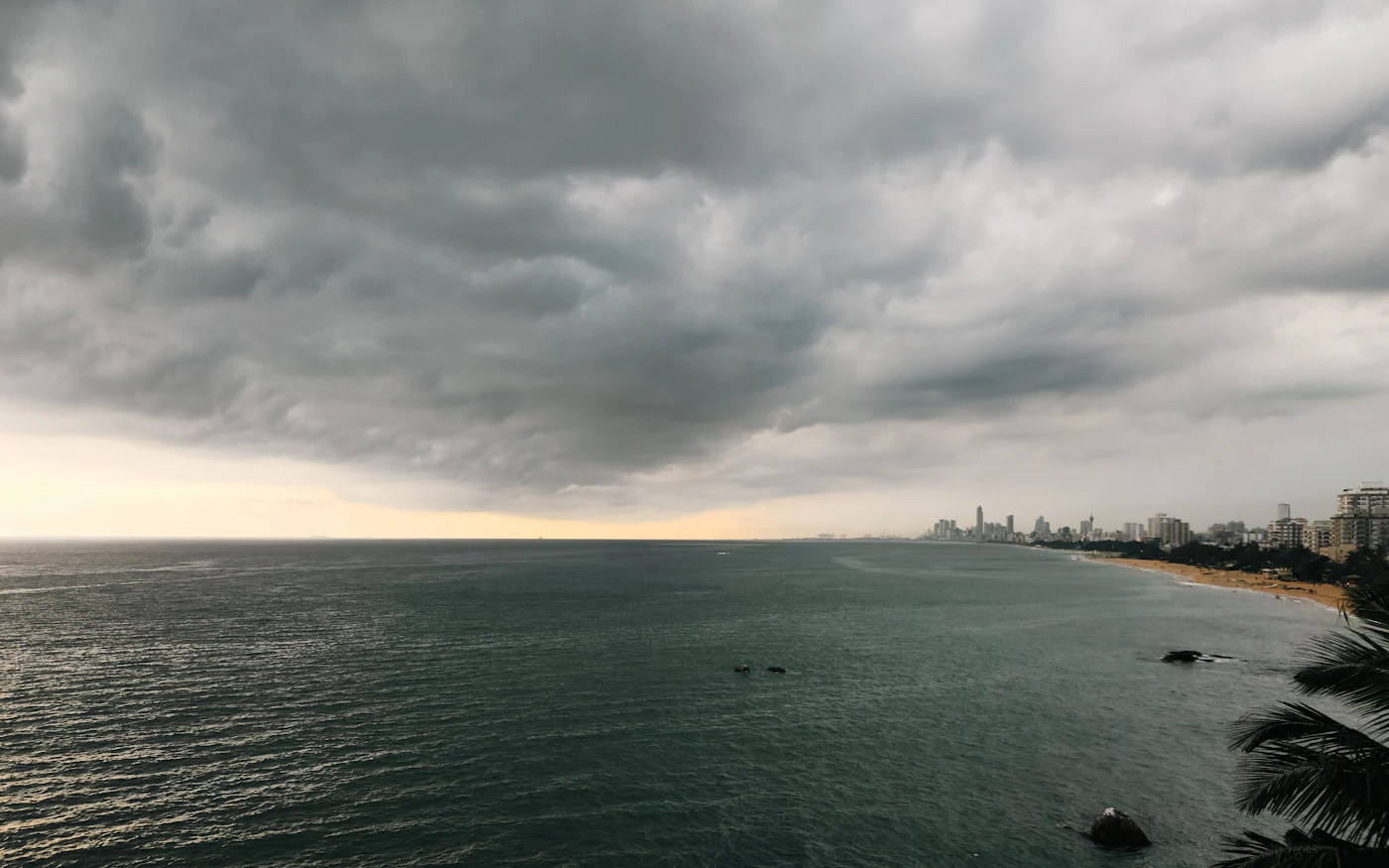 Monsoon cloud stacked over the sea at dusk