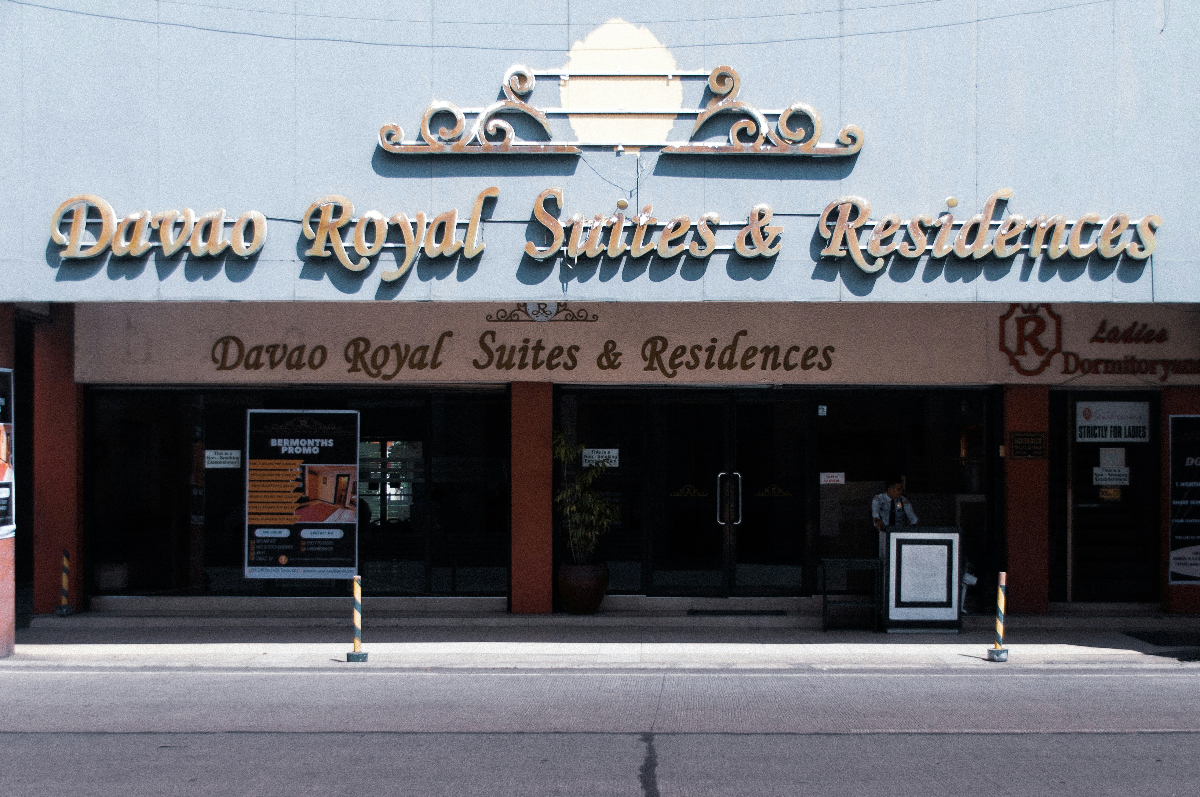 Stop image for Luxury Rockies Passage: Calgary to Kelowna in 3 Days - The image shows the entrance to davao royal suites. -  in Western Canada - Photo by Andrew Sacriz on Unsplash