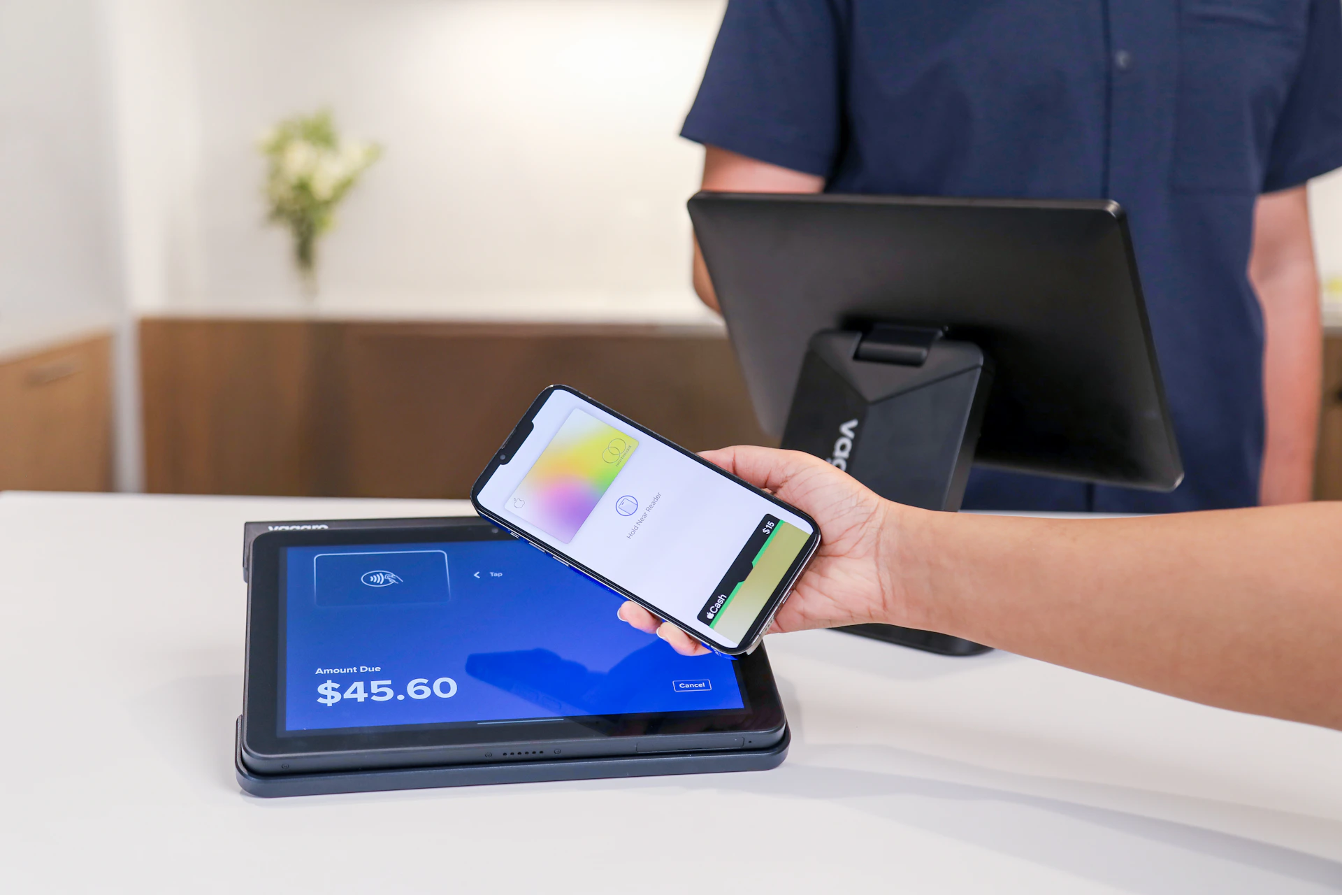Mobile payment being made at the checkout.