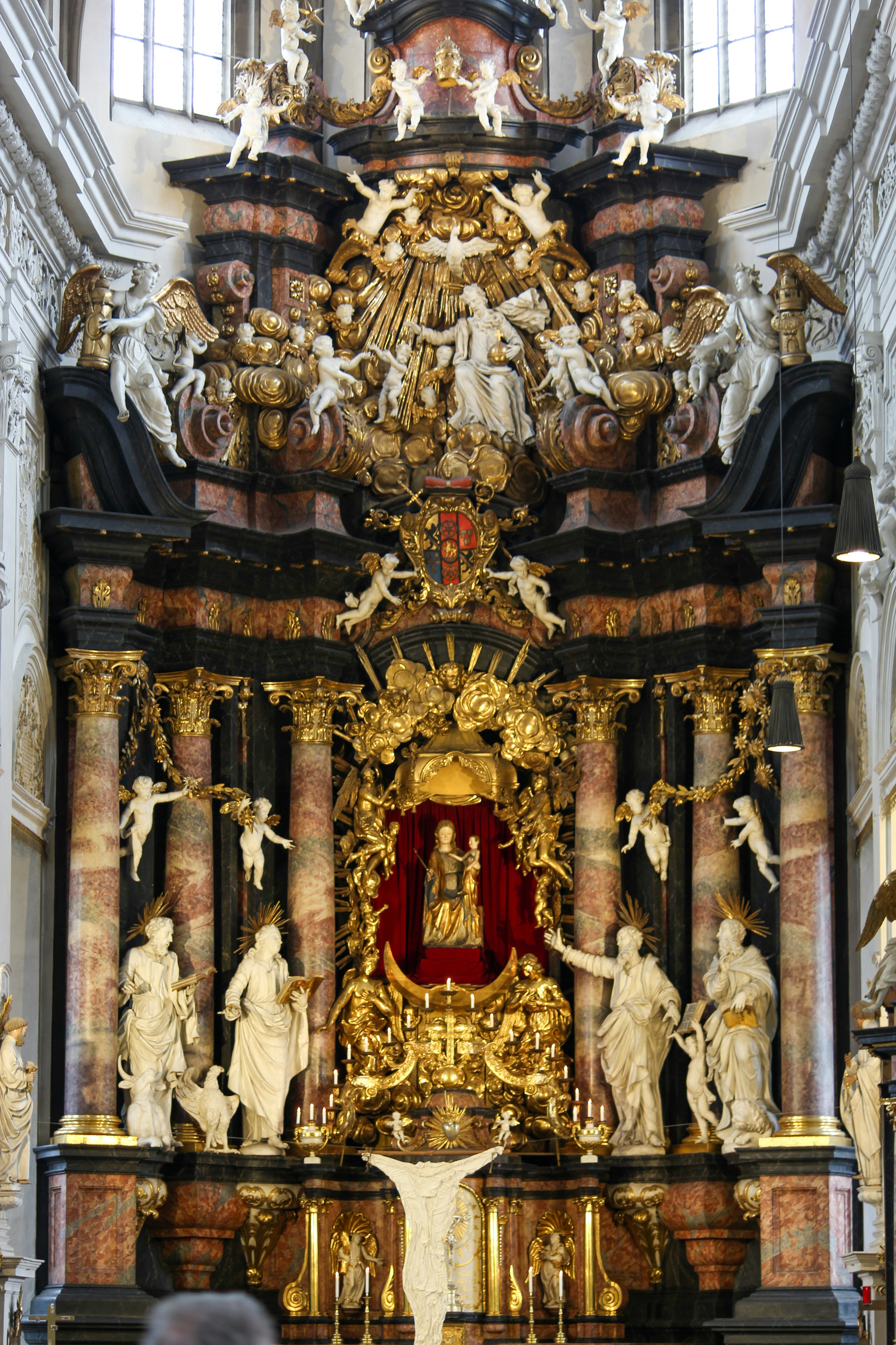 An ornate church altar with detailed decorations.