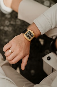 A man displays his luxury watch.