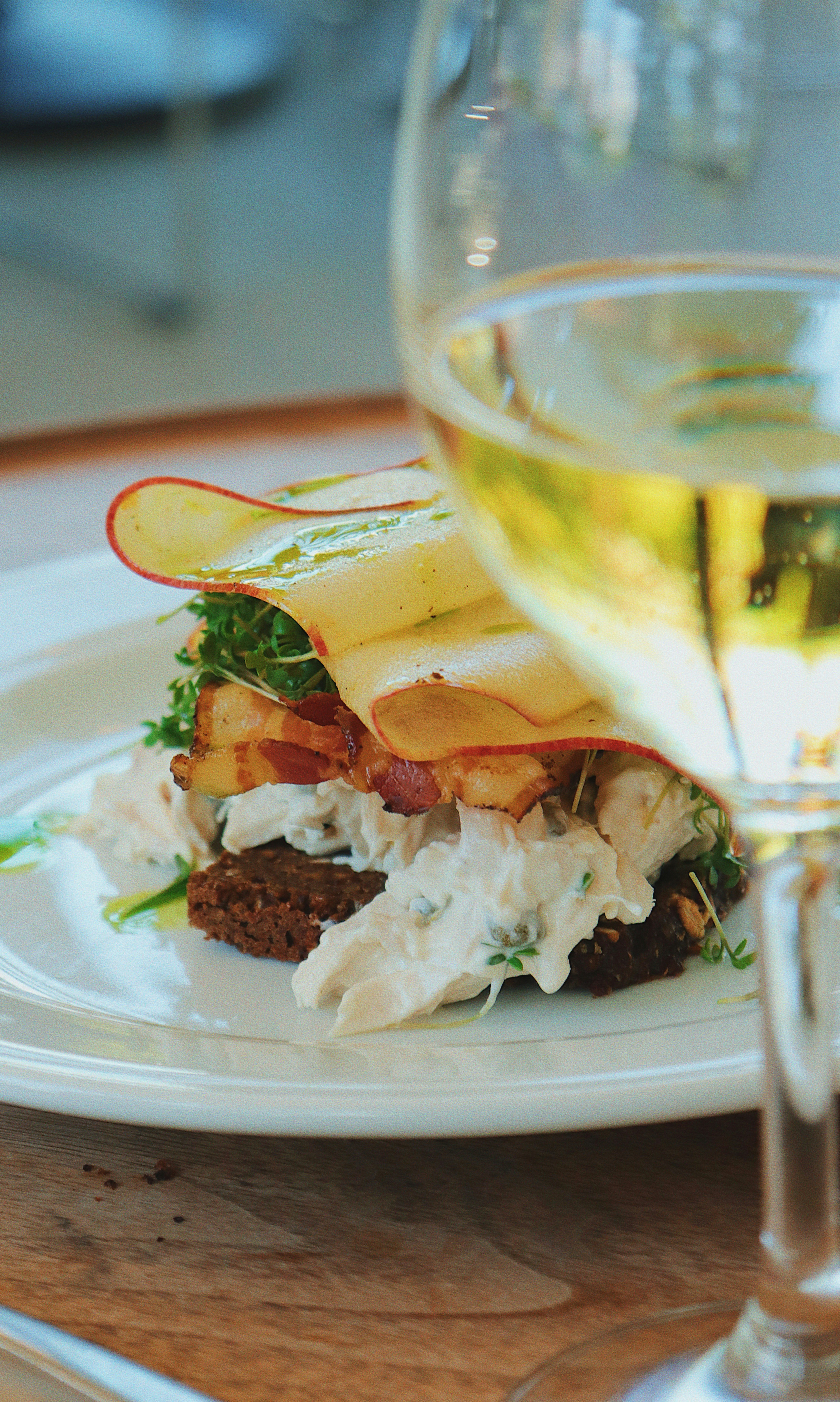 Appetizing dish with wine in a glass.