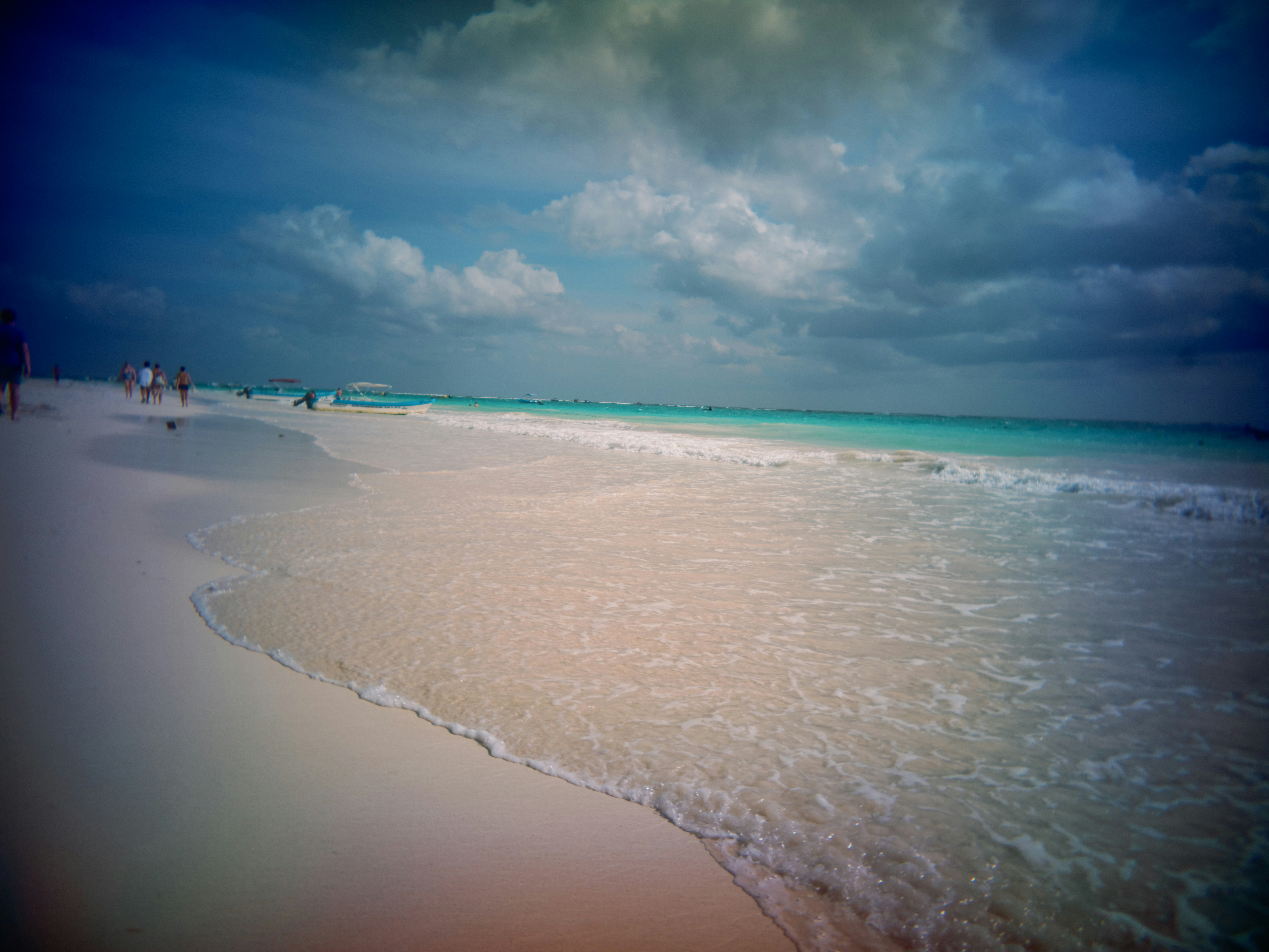 White sand beach meets the turquoise ocean.