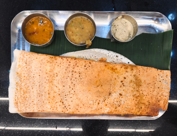 Masala dosa on a banana leaf