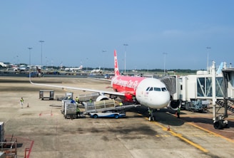 Airbus plane at an airport terminal.