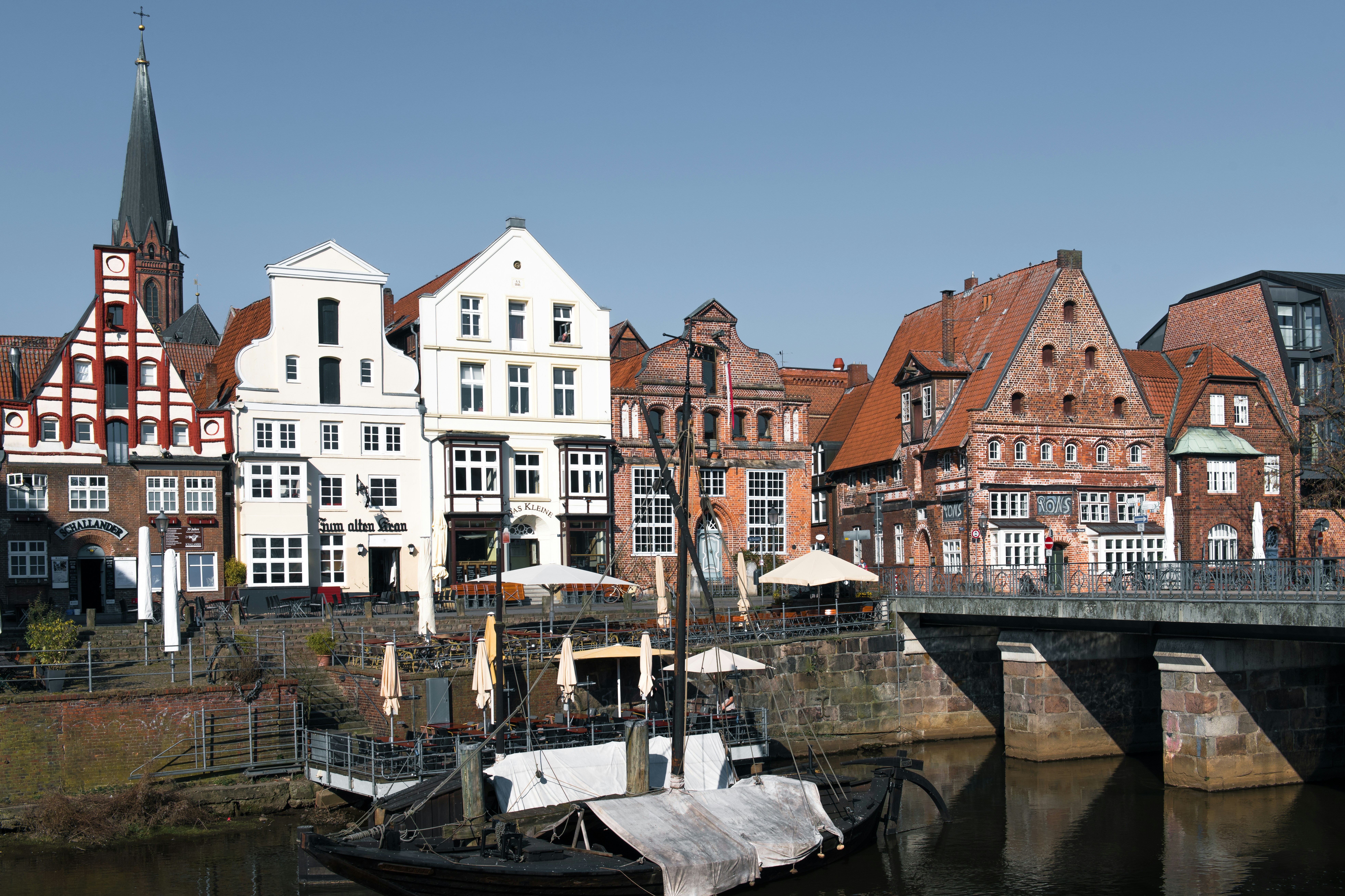Beautiful historic buildings line a waterway.