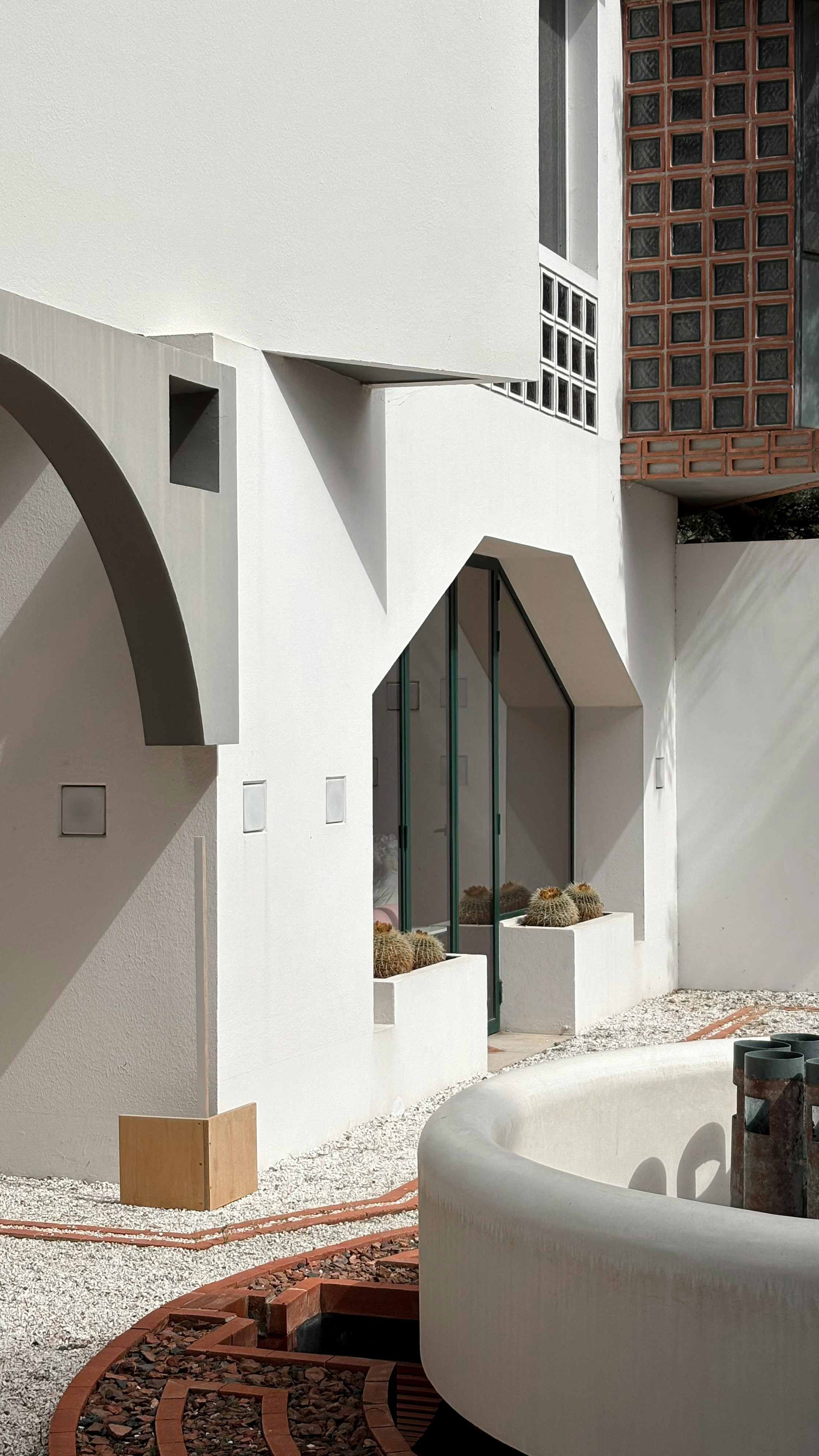 A modern building's exterior with geometric shapes.