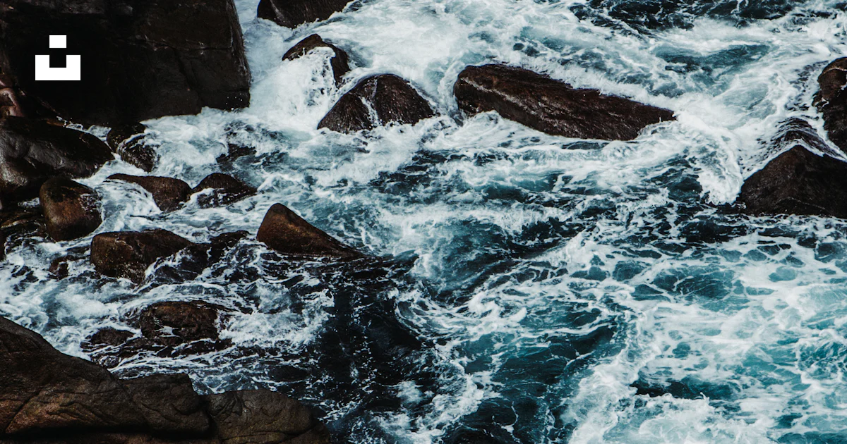 Rushing water surges through rocks and crevices. photo – Free Blue ...