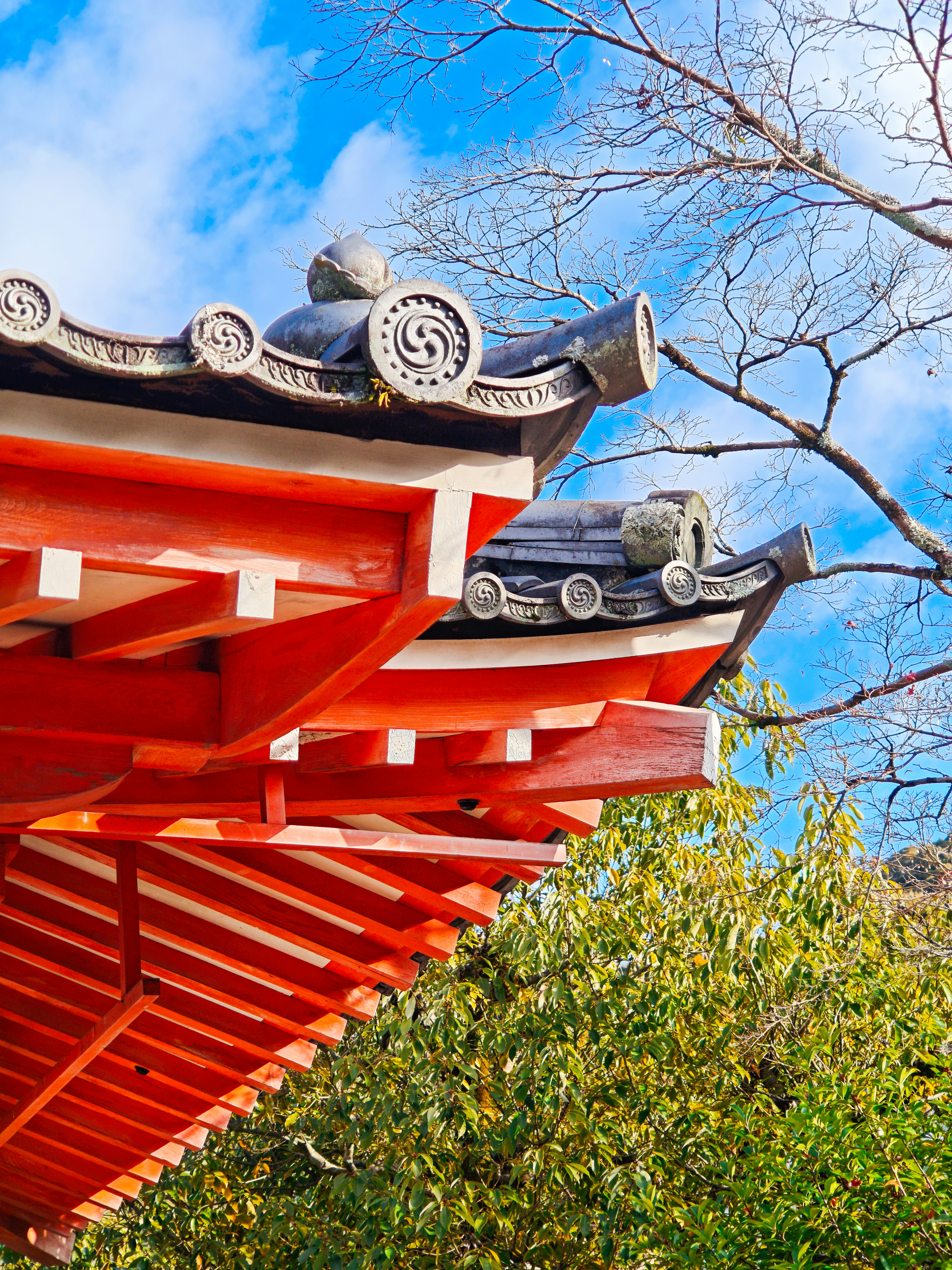 Red roof details of an asian temple.