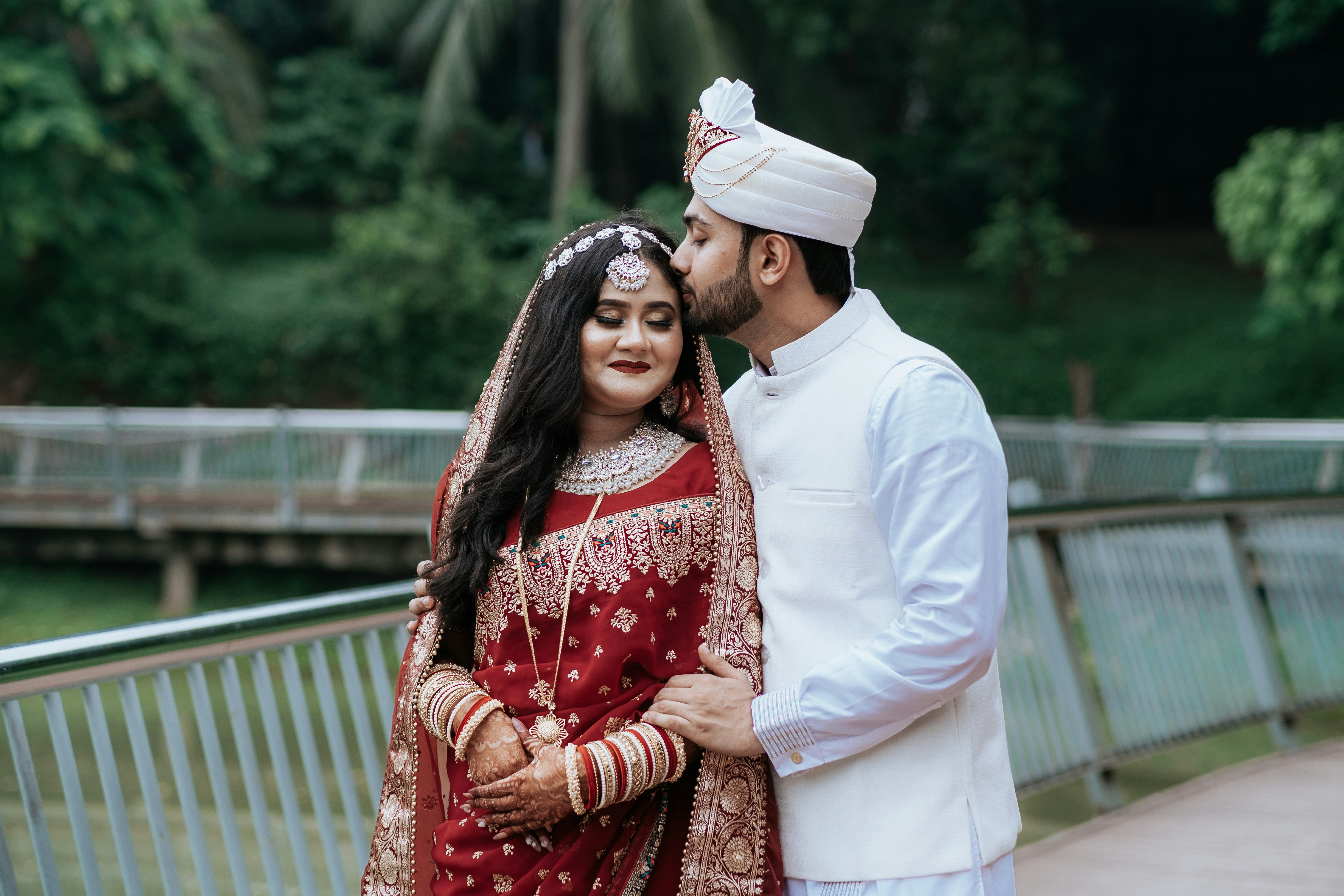 A couple lovingly embraces on their wedding day.