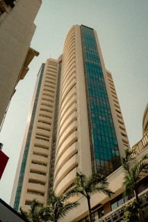 A tall modern building reaches towards the sky.