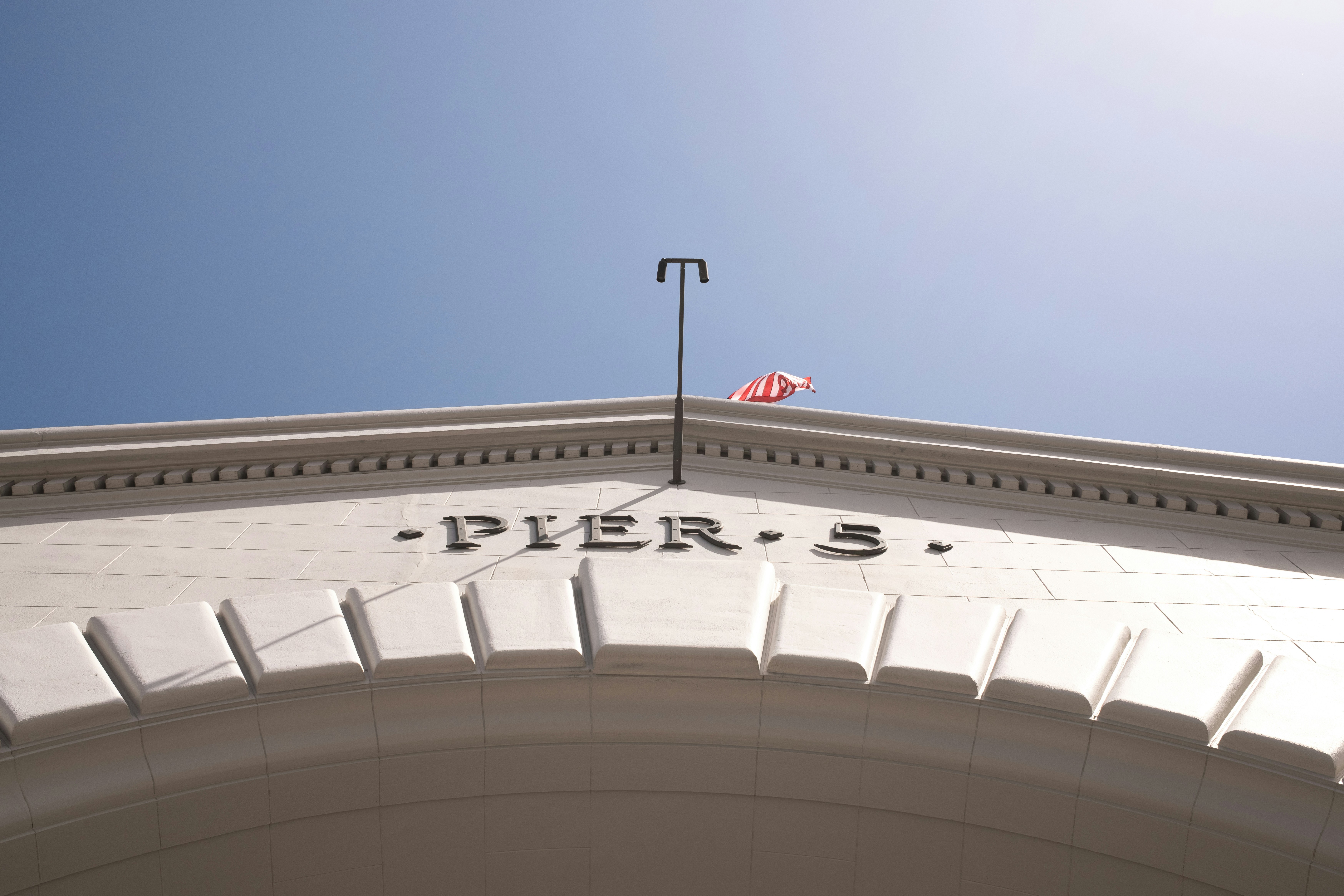 The building archway reads 