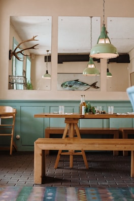 Stylish restaurant interior with wood furniture and decor.