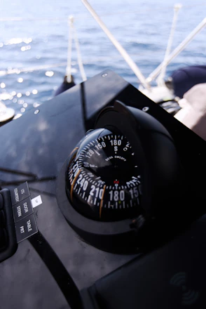 A nautical compass awaits a navigator's guidance.