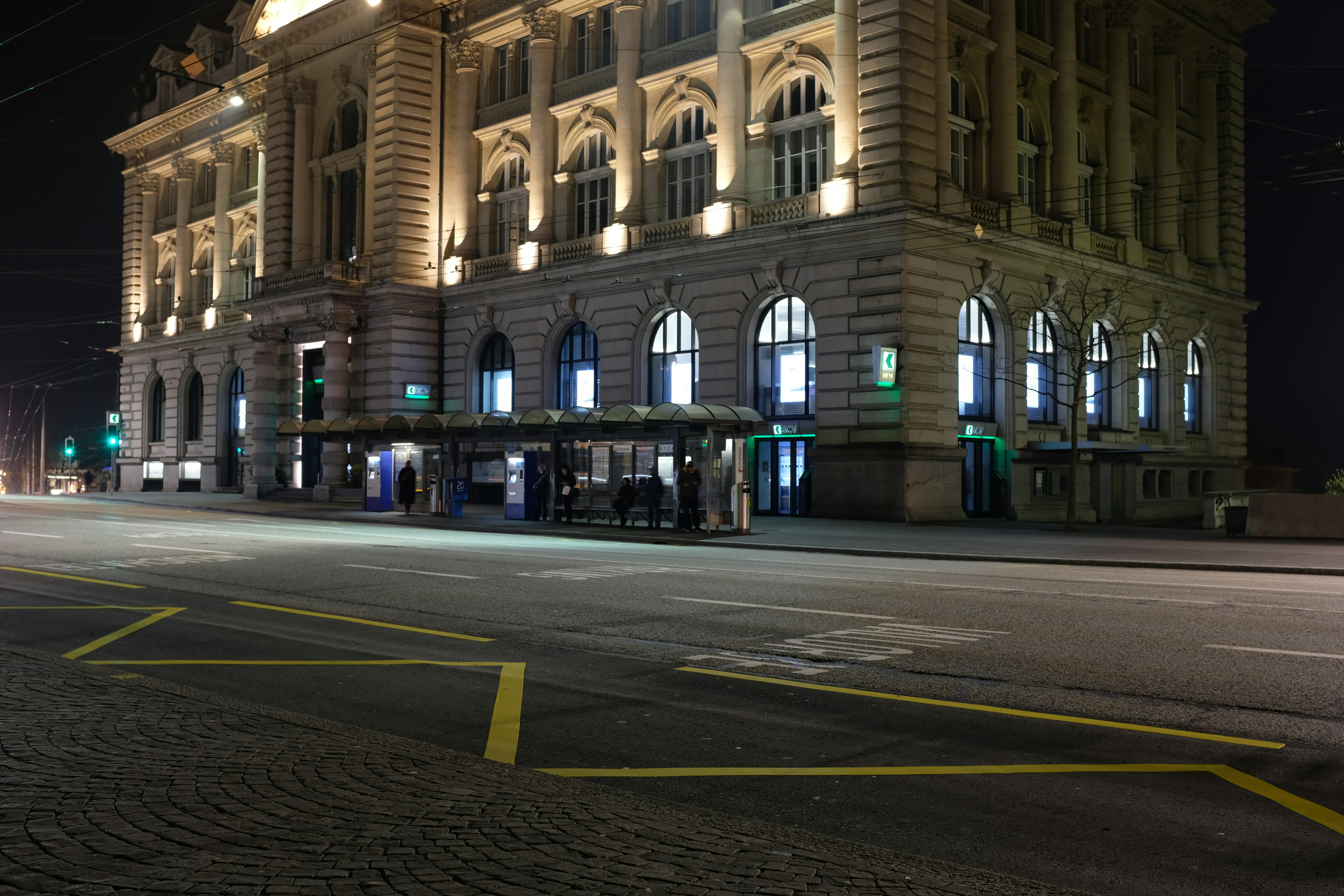 An illuminated building stands at night.