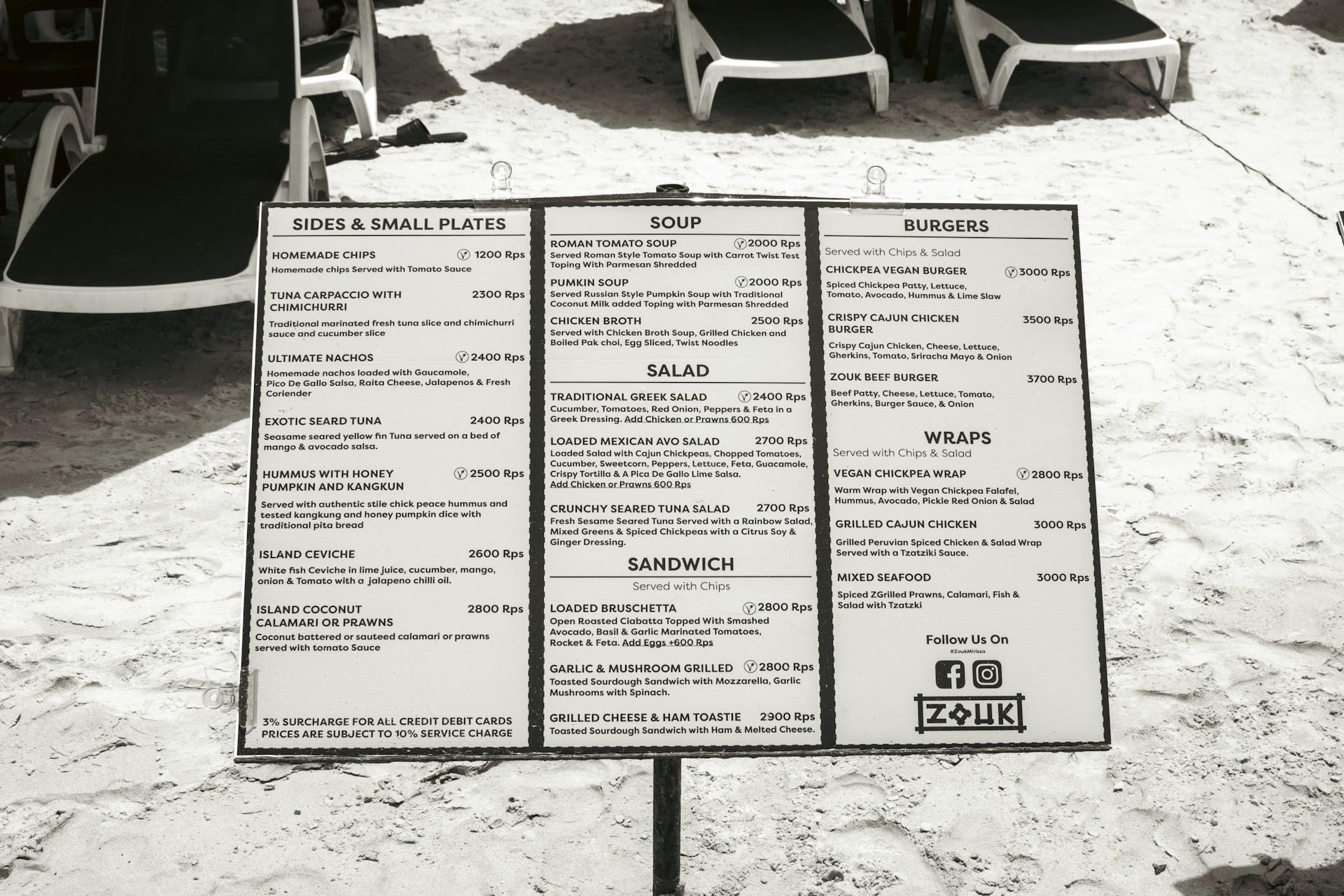 Beachside menu showing food and drink options.