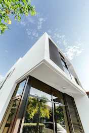 Modern white building against a beautiful, blue sky