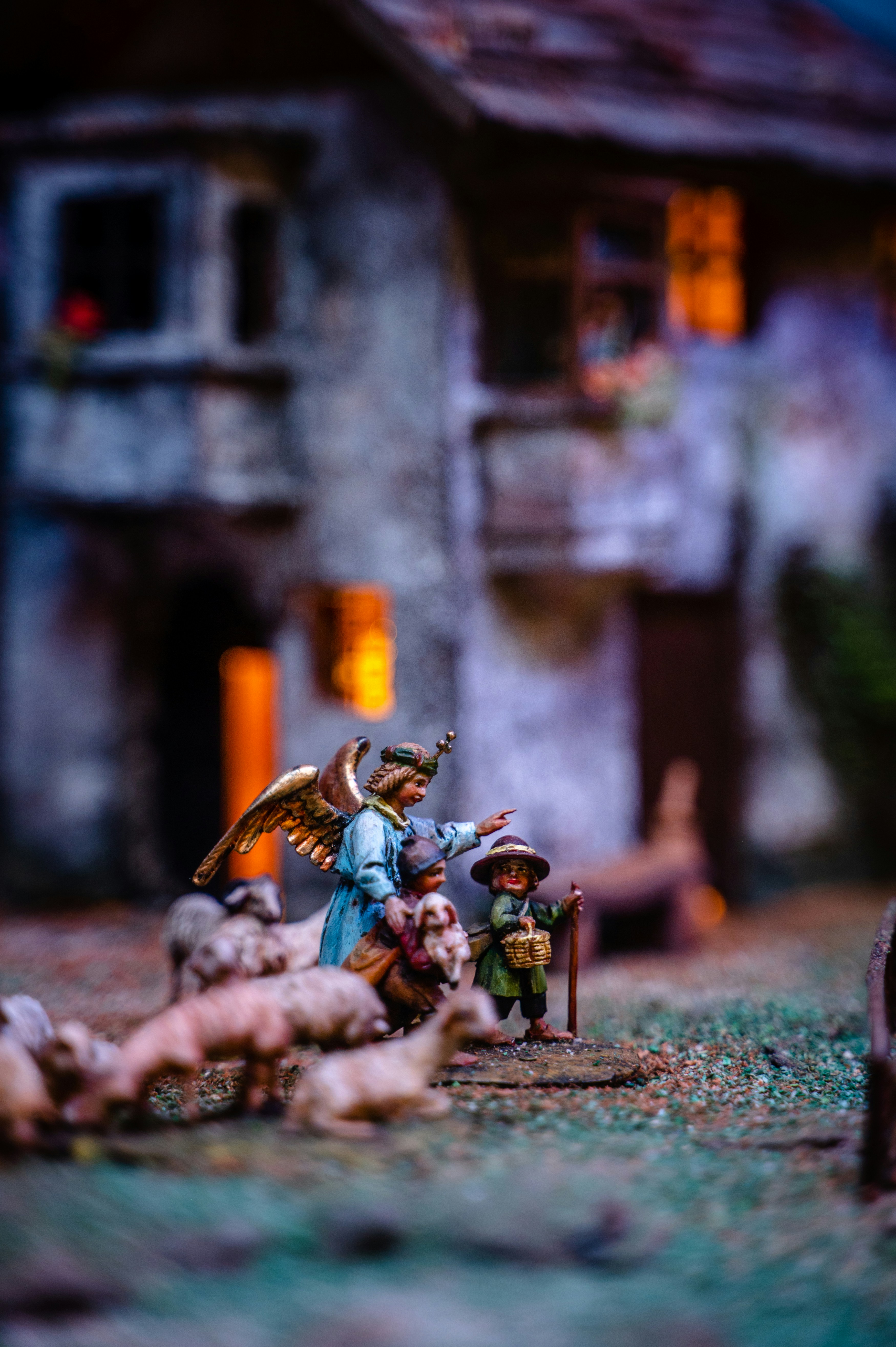 An angel leads a shepherd and his flock.