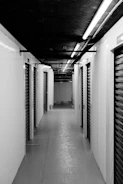 Empty hallway with storage units.