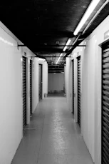 Empty hallway with storage units.